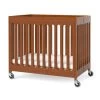 Foundations Compact Boutique™ Folding Crib,slatted Casters Foam Mattress,cherry